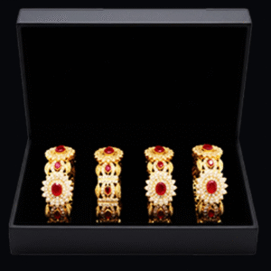 Elegant Gold-Plated Bangles with Red Stone Embellishment