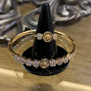 luxury gold wheel medallion bracelet and ring pair